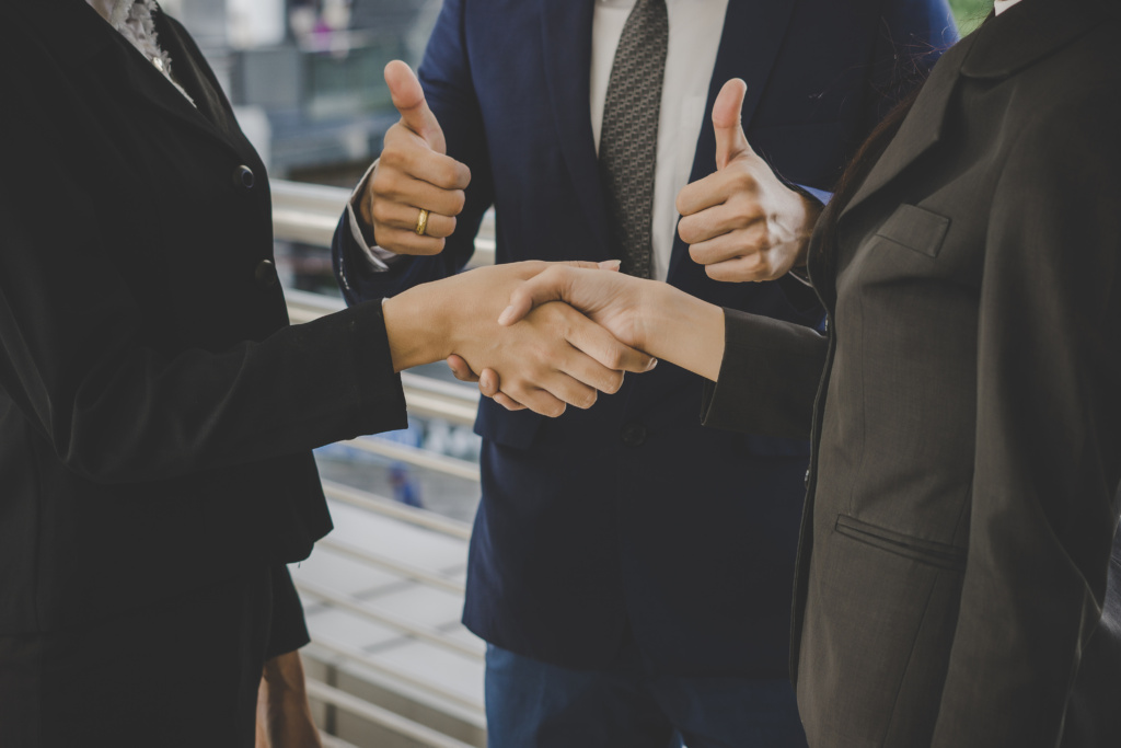 business people shaking hands finishing up meeting deals business concept 1024x683 - How Can Warehouse Management Software Improve Your Business?