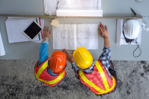 top view group engineering team is meeting planning construction work constructio 300x199 - Optimise Construction Project Management With ERP Software